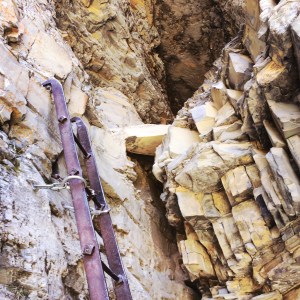 Cllimb this ladder to access the natural tunnel. Duck walk leaning left on the way to the lake, duck walk leaning right on the way out. 