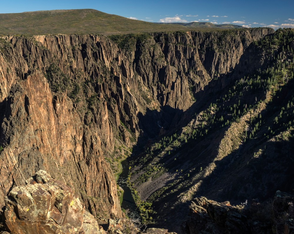 The Gunnison River cuts deep into the canyon.